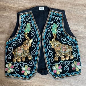 Bohemian vintage embroidered vest .